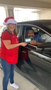 Dade City Manager with a member who won a Small Business Saturday Gift Card